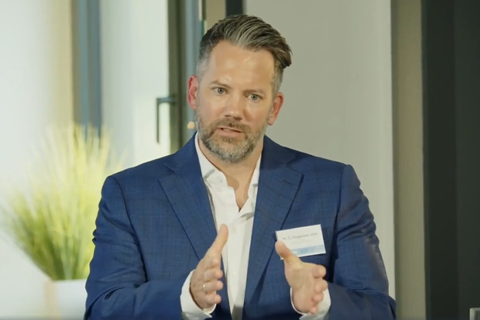 Dr. Christian Coppeneur-Gülz speaks at the INA 2023